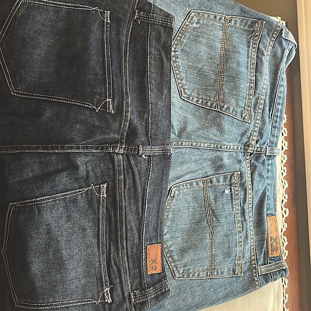 Two pairs of X2 boot cut women’s jeans. Low rise. Great condition. Size 6